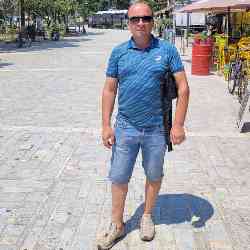Single Albanian man in Berat, Qarku i Beratit, Albania